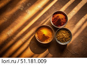 Three Bowls of Spices on a Brown Background With Sunlight. Generative AI. Стоковое AI-изображение, AI-художник Roman Zavorotny / Фотобанк Лори