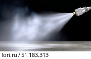 Water spray nozzle releasing mist in a dark environment at close range. Стоковое AI-изображение, AI-художник Katsiaryna Repich / Фотобанк Лори