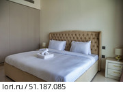 Inviting Bedroom in a Modern House on a Bright Morning in Dubai. Стоковое фото, фотограф Aleksandr Golubev / Фотобанк Лори
