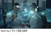 Two scientists collaborate on advanced research in a technologically equipped lab against a nighttime city backdrop. Стоковое AI-видео, аниматор Данила Большаков / Фотобанк Лори
