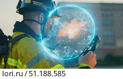 A firefighting crew gathers equipment and strategizes to combat an ongoing wildfire in a mountainous region under sunny conditions. Стоковое AI-видео, аниматор Данила Большаков / Фотобанк Лори