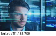 A dedicated professional examines complex data visualizations and trends in a sleek office setting late at night. Стоковое AI-видео, аниматор Данила Большаков / Фотобанк Лори