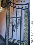 Tbilisi, Georgia - 04 January, 2023: Shota Rustaveli Avenue. Drawing of Harry Potter on the wall. Редакционное фото, фотограф Наталия Кирсанова / Фотобанк Лори