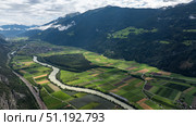 Inn river meandering through Tyrolean agricultural landscape in Austria. Стоковое фото, фотограф Данил Руденко / Фотобанк Лори