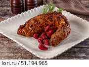 Baked pork sirloin with cornus. Стоковое фото, фотограф Андрей Старостин / Фотобанк Лори
