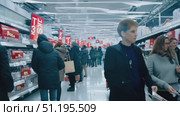 Crowds of shoppers navigate a bustling retail environment filled with festive displays and holiday sales, creating a lively shopping atmosphere. Стоковое AI-видео, аниматор Данила Большаков / Фотобанк Лори
