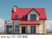 House Exterior. Roof Window. Second floor among blue sky. Mansard attic. Newly build houses. Gable roof with skylight, asphalt roofing, shingles. Residential Home. Vinyl Siding. Polymeric roof-tiles. Стоковое AI-изображение, AI-художник Марина Демидюк / Фотобанк Лори