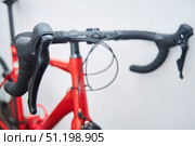 Details of a sports bike in close-up. A road bike for cycling or triathlon. Стоковое фото, фотограф Наталия Кирсанова / Фотобанк Лори
