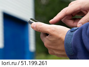 Phone fraud.Talking to phone scammers. Withdrawal of money via the Internet. Стоковое фото, фотограф Александр Поташев / Фотобанк Лори