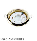 Round gold metal recessed ceiling light fixture frame for spotlights, used for mounting lamps in a stretch ceiling and lighting equipment store. Стоковое фото, фотограф Татьяна Терехина / Фотобанк Лори