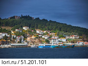 ISTANBUL, TURKEY - NOVEMBER 26, 2021: Building on the Princes' Islands, view from the ship. The Sea of Marmara. Редакционное фото, фотограф Наталия Кирсанова / Фотобанк Лори