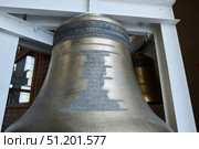 St. Petersburg, Russia - May 25, 2021: Peter and Paul Cathedral. A large gift bell from the Romanov Foundation. Редакционное фото, фотограф Наталия Кирсанова / Фотобанк Лори