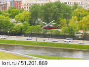 SAINT PETERSBURG, RUSSIA - May 27, 2021: Helicopter over the city. Редакционное фото, фотограф Наталия Кирсанова / Фотобанк Лори