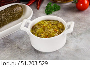 Souce gherkin relish with marinated cucumbers. Стоковое фото, фотограф Андрей Старостин / Фотобанк Лори