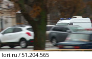 the ambulance in the street racing. Стоковое видео, видеограф Алексей Сергеев / Фотобанк Лори