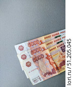 Close up of Russian currency. Banknotes nominal 5000 rubles. Стоковое фото, фотограф Denis Vostrikov / Фотобанк Лори