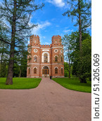 Saint-Petersburg, Russia - May 28th, 2021. Red brick building with four towers - the Arsenal in the Alexander Park in winter. Pushkin, Tsarskoye Selo, Saint Petersburg. Редакционное фото, фотограф Denis Vostrikov / Фотобанк Лори