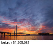 Saint-Petersburg, Russia - June 5th, 2021. Beautiful sunset view of Gazprom Arena in Saint-Petersburg. Редакционное фото, фотограф Denis Vostrikov / Фотобанк Лори