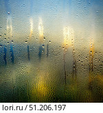 A Foggy Window Pane With Water Droplets and a Blurred View of the Sunrise. Generative AI. Стоковое AI-изображение, AI-художник Roman Zavorotny / Фотобанк Лори