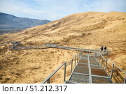 Dagestan, Russia. - January 06, 2024: Sarykum dune, the largest sand dune in Europe. Platforms for movement on the dune. Редакционное фото, фотограф Наталия Кирсанова / Фотобанк Лори
