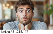 A man looks perplexed and frustrated while sitting at a cafe, holding his face in his hands as he contemplates his next move. Стоковое AI-видео, аниматор Данила Большаков / Фотобанк Лори