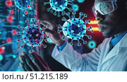 A researcher analyzes intricate digital representations of viruses while working in a high-tech laboratory dedicated to health safety. Стоковое AI-видео, аниматор Данила Большаков / Фотобанк Лори