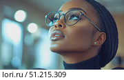 A woman in a stylish outfit looks thoughtfully upward, her glasses accentuating her features, in a cozy cafe atmosphere. Стоковое AI-видео, аниматор Данила Большаков / Фотобанк Лори
