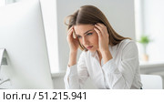 Business problem concept with stressed young woman suffering from headache at work, tired female employee feeling pain and pressure in modern office for burnout theme. Стоковое AI-изображение, AI-художник Павел Муравьев / Фотобанк Лори
