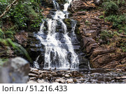 Yukankoski Waterfall (White Bridges) in the Republic of Karelia on a summer evening, Russia. Стоковое фото, фотограф Photojuli / Фотобанк Лори