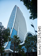 Batumi, Georgia. - July 04, 2023: the buildings of modern architecture in which the Marriott hotel is located in the center of Batumi. Редакционное фото, фотограф Наталия Кирсанова / Фотобанк Лори