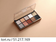 Eyeshadows set top view. Brown beige eyeshadow texture swipe on a white. Cosmetic product swatch. Crushed eye shadows palette. Shiny, matte eye shadow smears. Girly concept. Beauty brand. Fashion blog. Стоковое AI-изображение, AI-художник Марина Демидюк / Фотобанк Лори