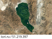 Satellite view showing blue-green algae swirling around the waters of Pyramid Lake, Nevada. Stocktrek Images, Inc./TASS. Стоковое фото, агентство ТАСС / Фотобанк Лори