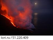 Stromboli lava flow, sea entry, Aeolian Islands, north of Sicily, Italy. Martin Rietze/Stocktrek Images/TASS. Стоковое фото, агентство ТАСС / Фотобанк Лори