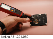 The SMD component tester. Investigation of the parameters of the SMD components using a tester probe. Стоковое фото, фотограф Valeriy Lushchikov / Фотобанк Лори