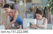 Woman tailor draw dress pattern with curve ruler on paper, female master seamstress sewing. Стоковое видео, видеограф Яков Филимонов / Фотобанк Лори