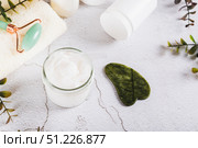 Moisturizing cream with beef tallow in a jar on the table. Стоковое фото, фотограф Елена Руй / Фотобанк Лори