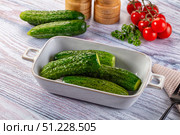 Homemade lightly salted cucumbers snack. Стоковое фото, фотограф Андрей Старостин / Фотобанк Лори