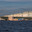 The State Hermitage Museum (Winter Palace) from the Palace Bridge and the Neva River. Russia, Saint Petersburg, August 15, 2025. Редакционное фото, фотограф Photojuli / Фотобанк Лори