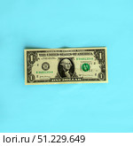 Dollar on a blue background. Стоковое фото, фотограф Юлия Николаева / Фотобанк Лори