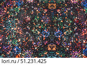 Hypnotic Kaleidoscopic Optical Illusion. Colorful Symmetrical Abstract on Dark Background. Стоковое фото, фотограф Zydrius Tartenis / Фотобанк Лори