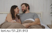 Loving mature couple interactions at home. Man and woman embracing, hugging, holding hands and dancing. Wife with husband intimate moments. couple is touching, cuddling, kissing. Natural lighting. 4K. Стоковое видео, видеограф Марина Демидюк / Фотобанк Лори