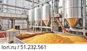 Industrial Grain Processing Facility With Large Storage Silos and Conveyor System. Generative AI. Стоковое AI-изображение, AI-художник Roman Zavorotny / Фотобанк Лори