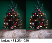 Celebrate the Holiday Season With a Vibrant Christmas Tree and Festive Decor on a Wooden Surface. Стоковое фото, фотограф Ольга Коваленко / Фотобанк Лори