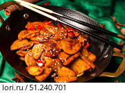 Stir-fried Delights in a Traditional Chinese Dish, With Chopstick Ready. Стоковое фото, фотограф Aleksandr Golubev / Фотобанк Лори