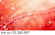 Abstract red background showing bokeh effect and light trails. Стоковое фото, фотограф David Kashakhi / Фотобанк Лори