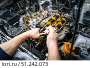 Car repair: overhaul of the V6 engine with detailed pulleys and parts. Стоковое фото, фотограф Енваев Андрей / Фотобанк Лори
