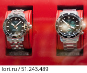 Luxury Swiss Diving Watches Displayed in Red Case. Редакционное фото, фотограф Sergakoff / Фотобанк Лори