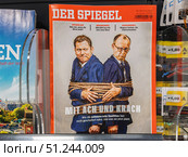 Contemporary German Magazine Cover Art Featuring Political Satire. Редакционное фото, фотограф Sergakoff / Фотобанк Лори