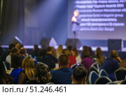 Speaker addressing audience at business conference with stage presentation. Стоковое фото, фотограф Антон Гвоздиков / Фотобанк Лори