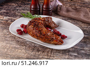 Baked pork sirloin with cornus. Стоковое фото, фотограф Андрей Старостин / Фотобанк Лори